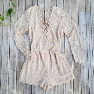 Lacy long sleeved romper L